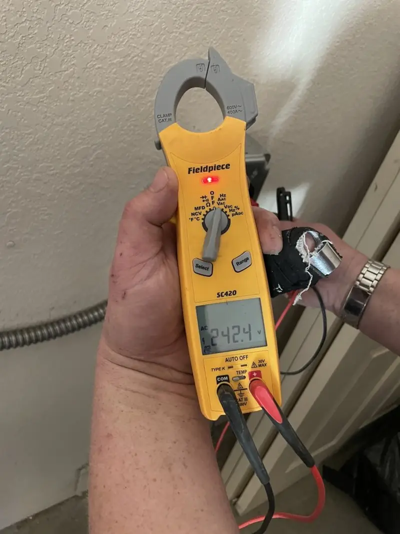 Voltage testing with clamp meter during Hot Tub / Pool Electrical Wiring in Terrytown